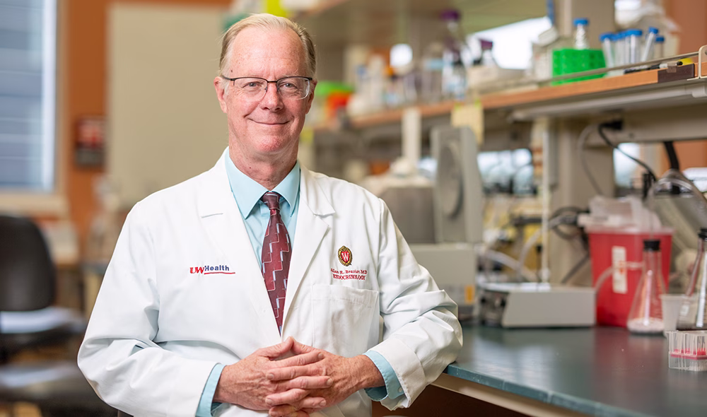Dr. Allan Brasier stands in his lab on the University of Wisconsin campus